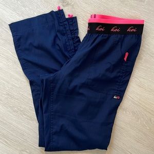 NWOT KOI scrub pants in navy blu and hot neon pink.